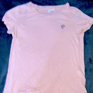pink shirt with black heart